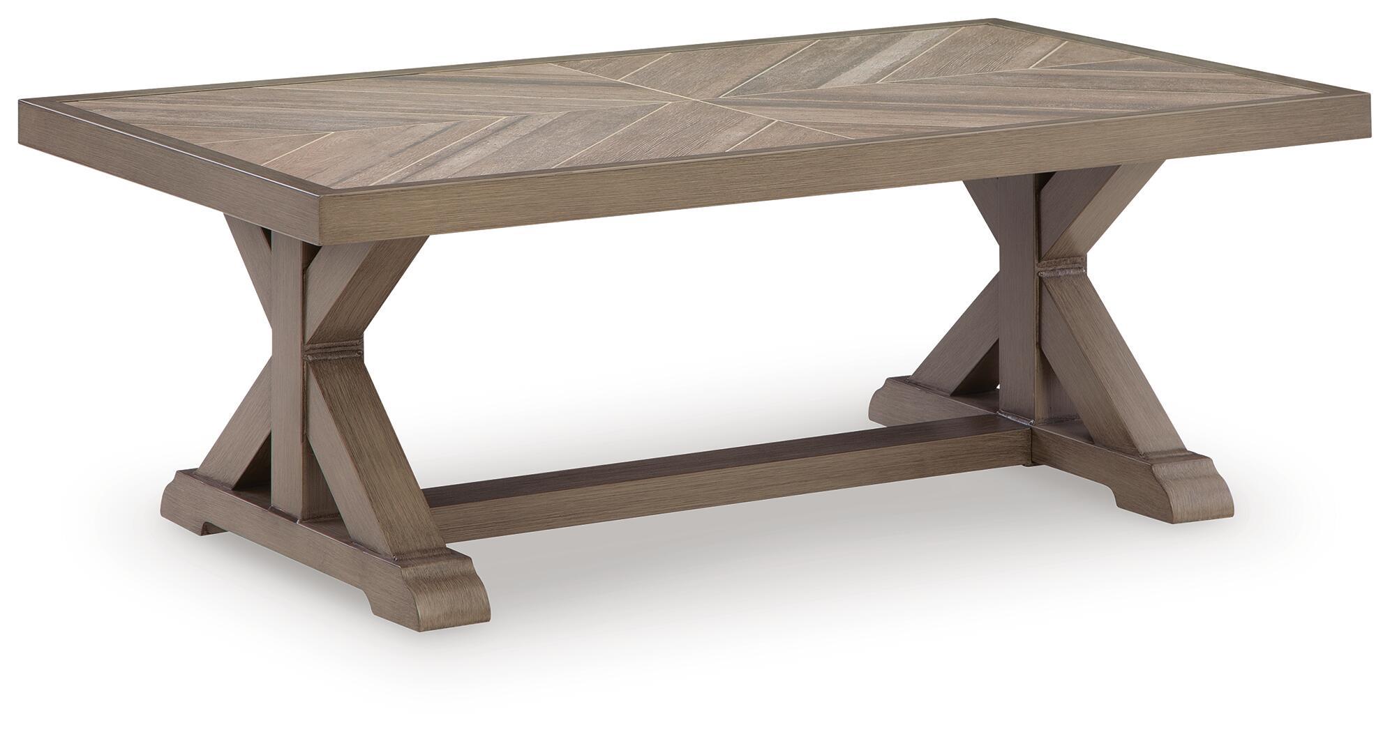 Beige rectangular cocktail table with beveled top and X-style support legs