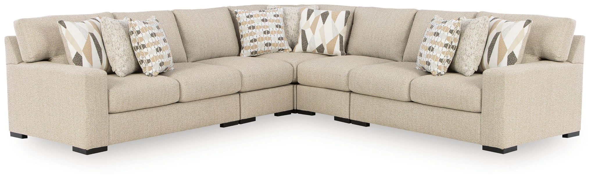 Beige fabric sectional sofa with corner chaise and decorative throw pillows