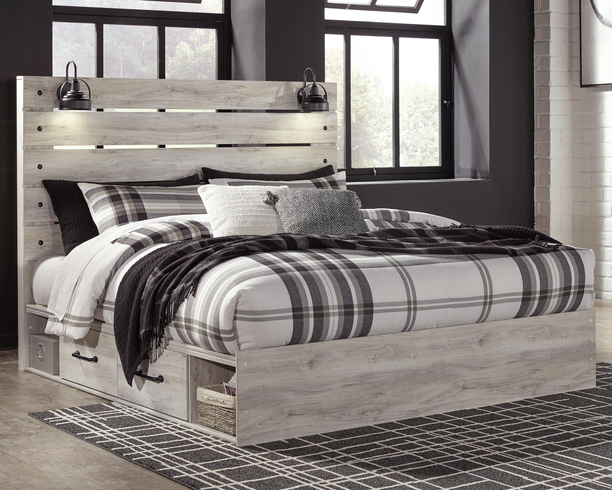 Beige panel bed with plaid bedding and two front storage drawers, slatted headboard