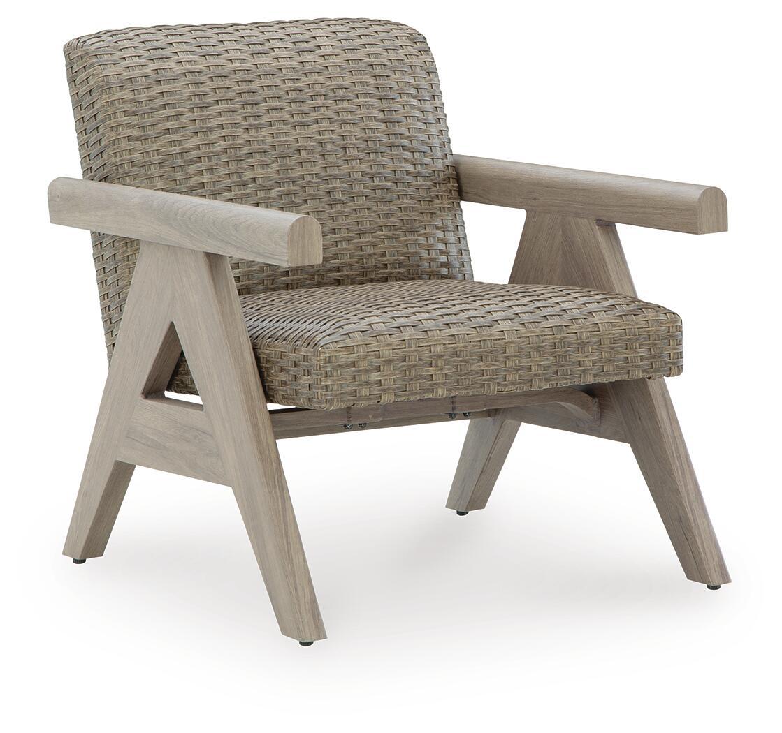 Beige woven rocking lounge chair with padded armrests and angled wooden base