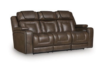Brown leather power recline sofa with adjustable headrests and tufted seat cushions