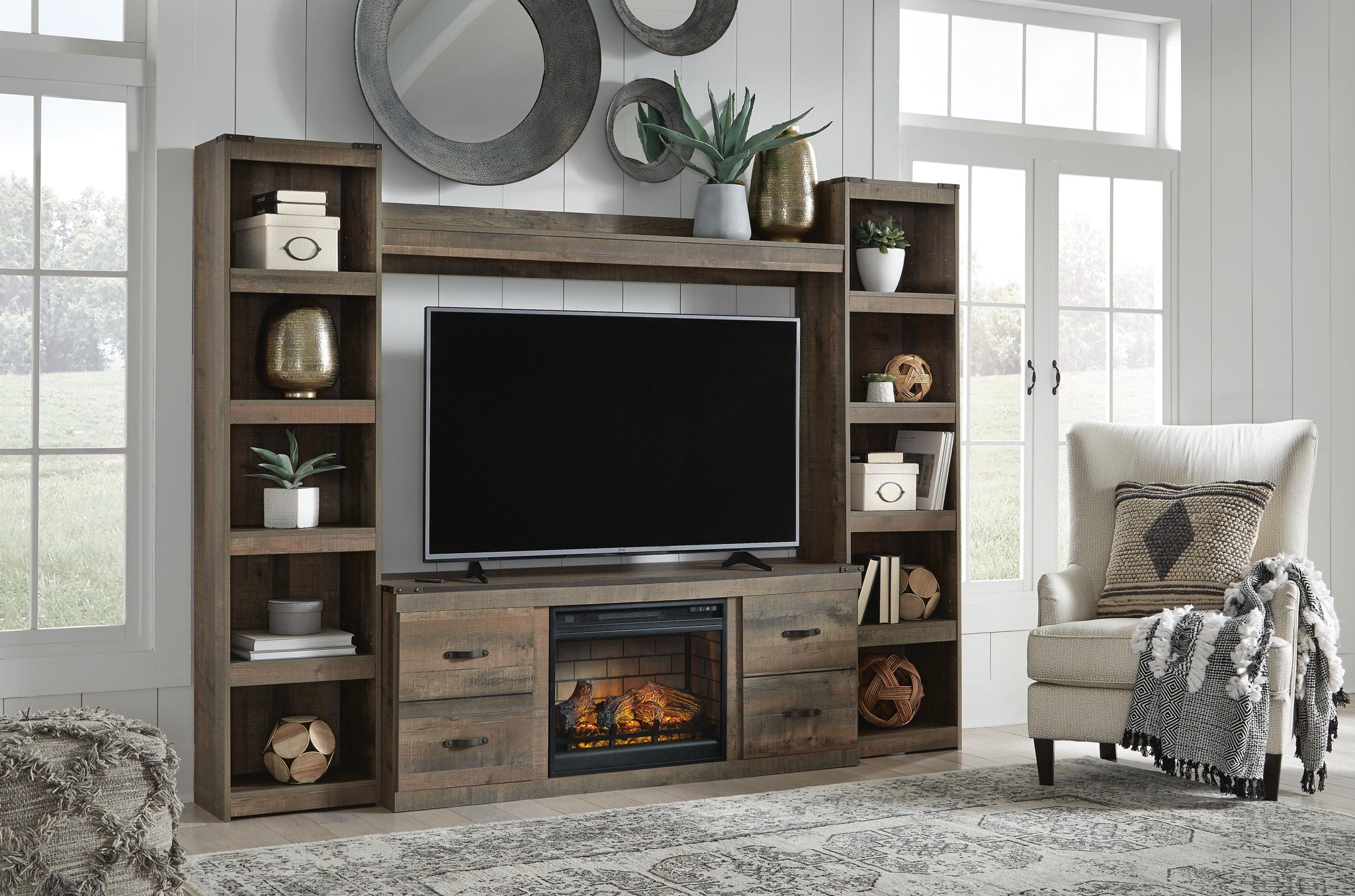 Dark brown media console with TV opening, built-in faux fireplace and storage drawers