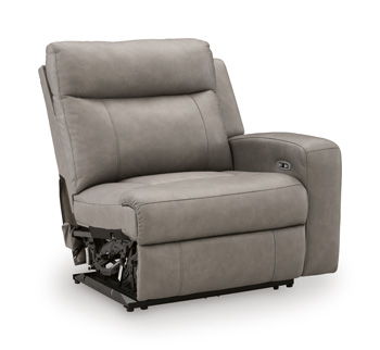 Gray fabric wall-hugger power recliner with padded arms and recline base