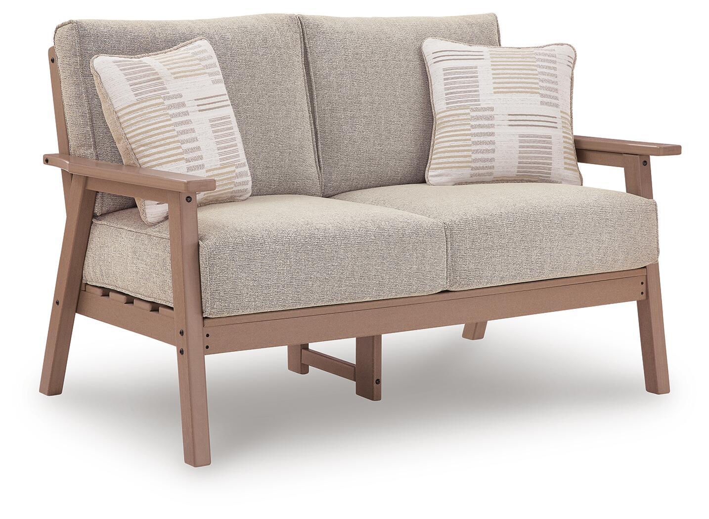 Grey two-seat loveseat with driftwood frame cushion and two striped throw pillows.