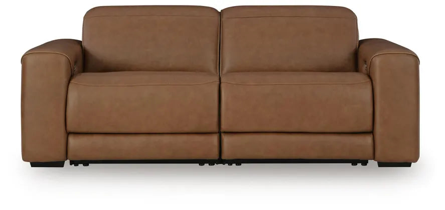 Caramel brown reclining sectional sofa with padded arms and wide seat cushions