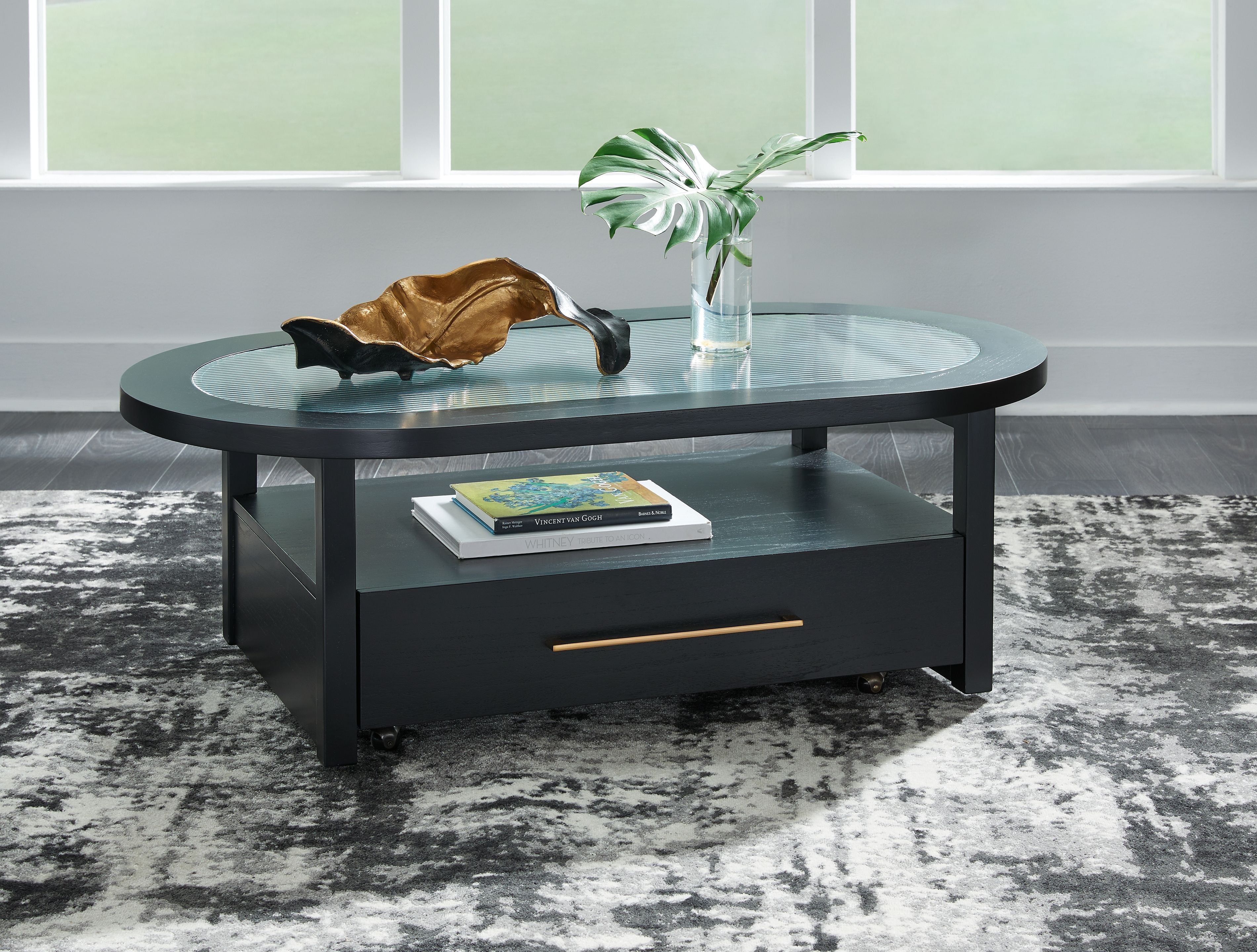 Winbardi - Oval Cocktail Table - Black