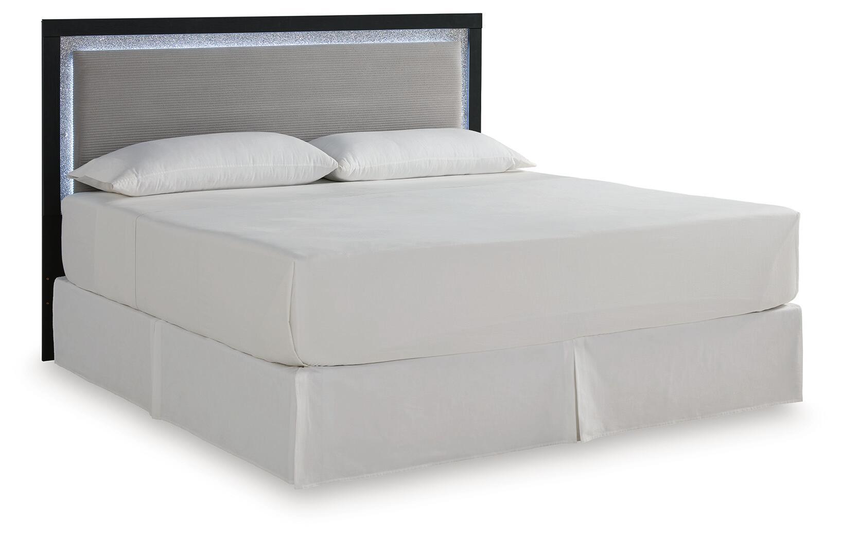 Light gray upholstered panel headboard with dark frame and open textured back panel.