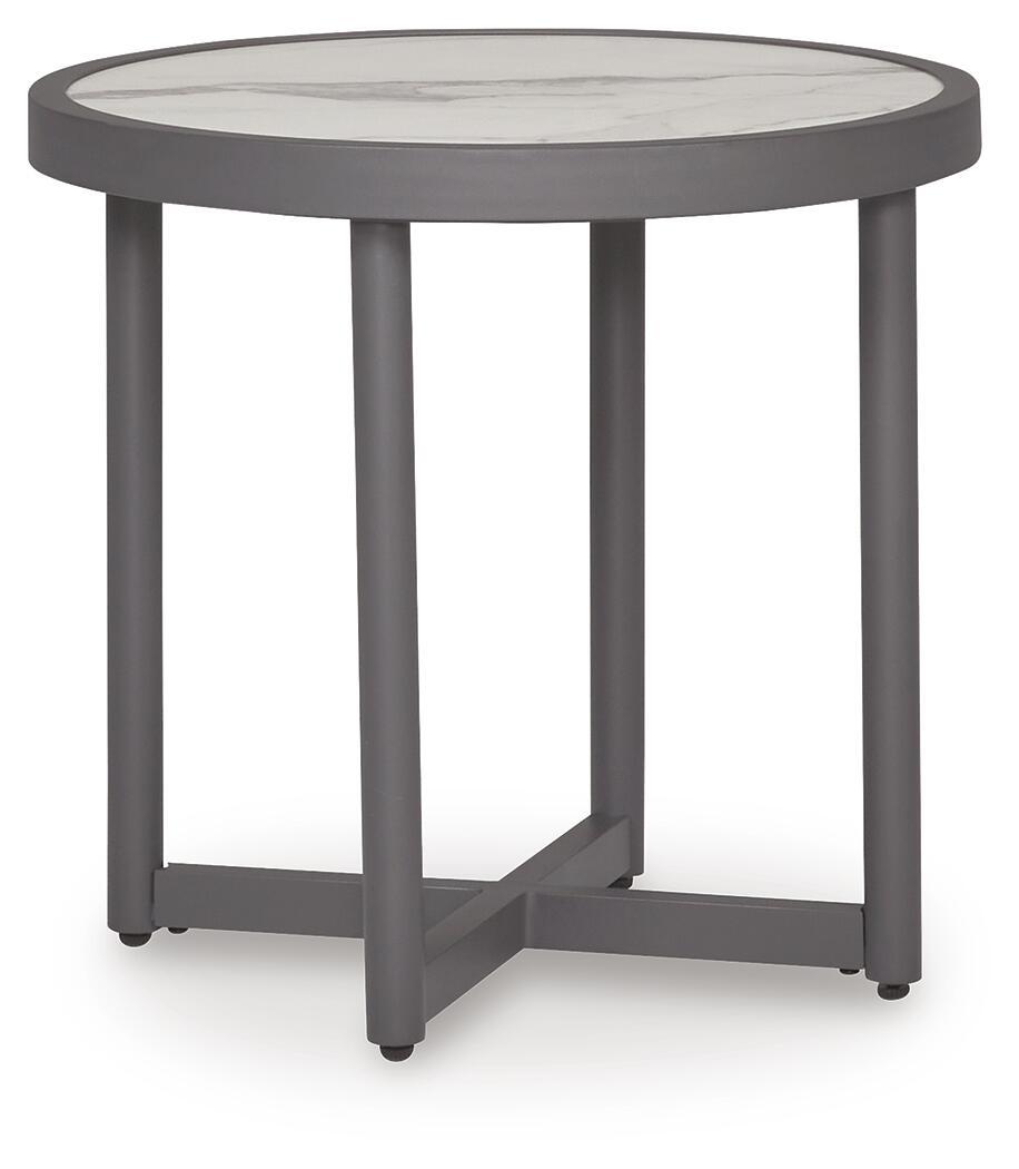 Gray round outdoor table with light marble-look top and four tapered legs