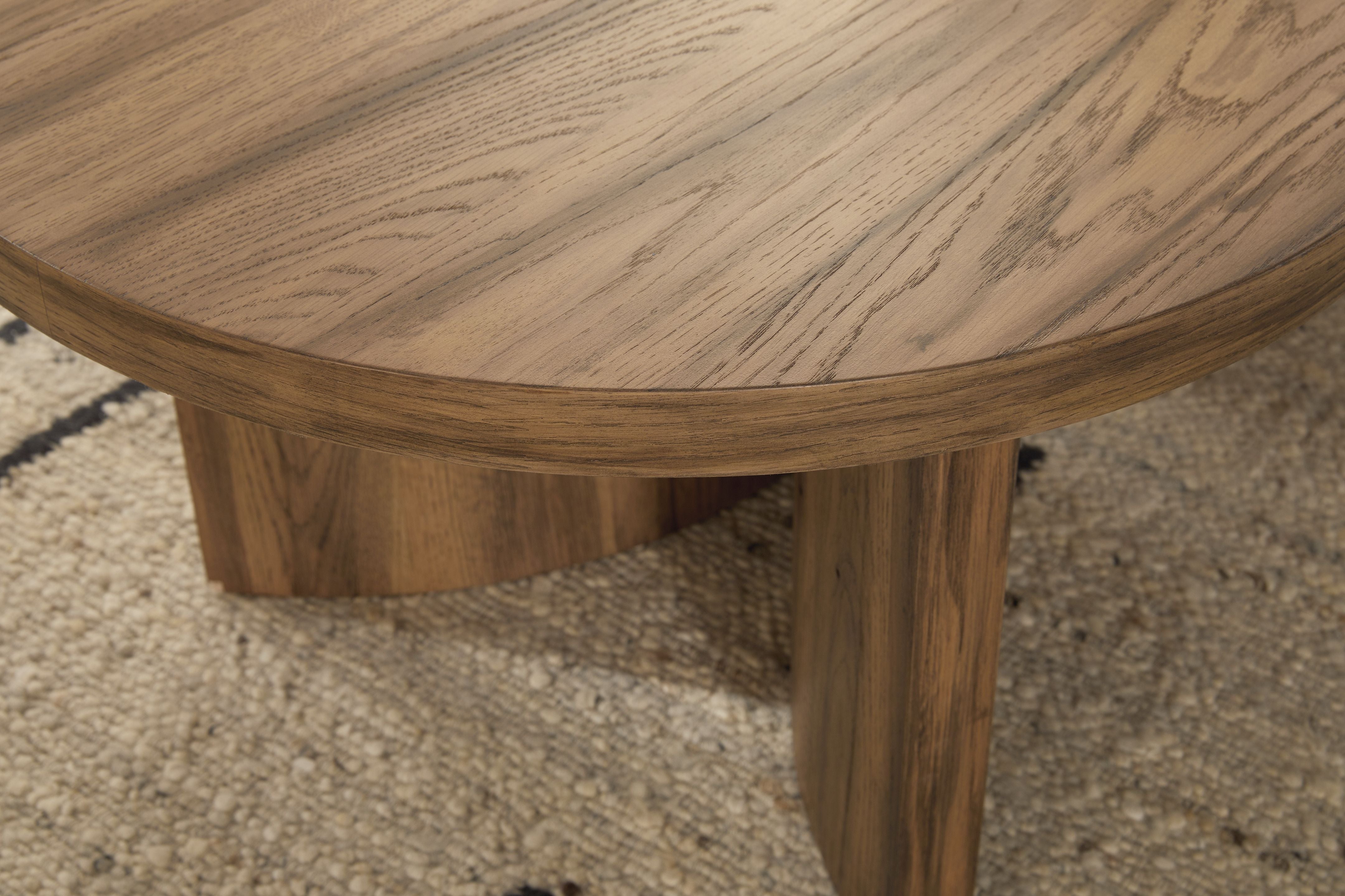 Austanny Warm Brown - Oval Cocktail Table