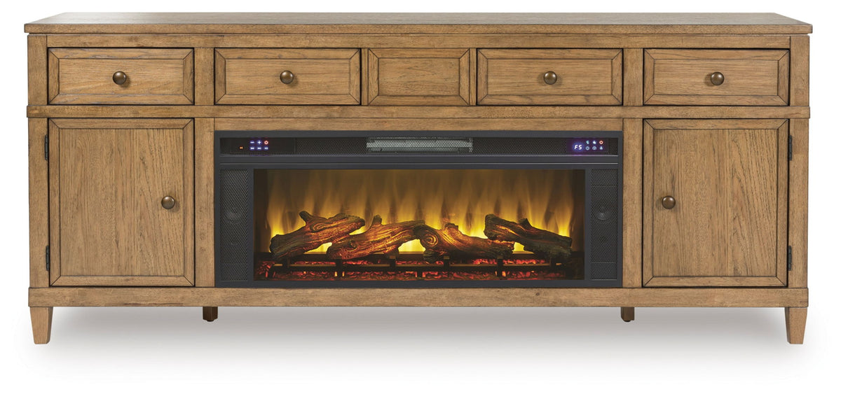 Light brown TV console with four drawers, two doors, and electric fireplace insert
