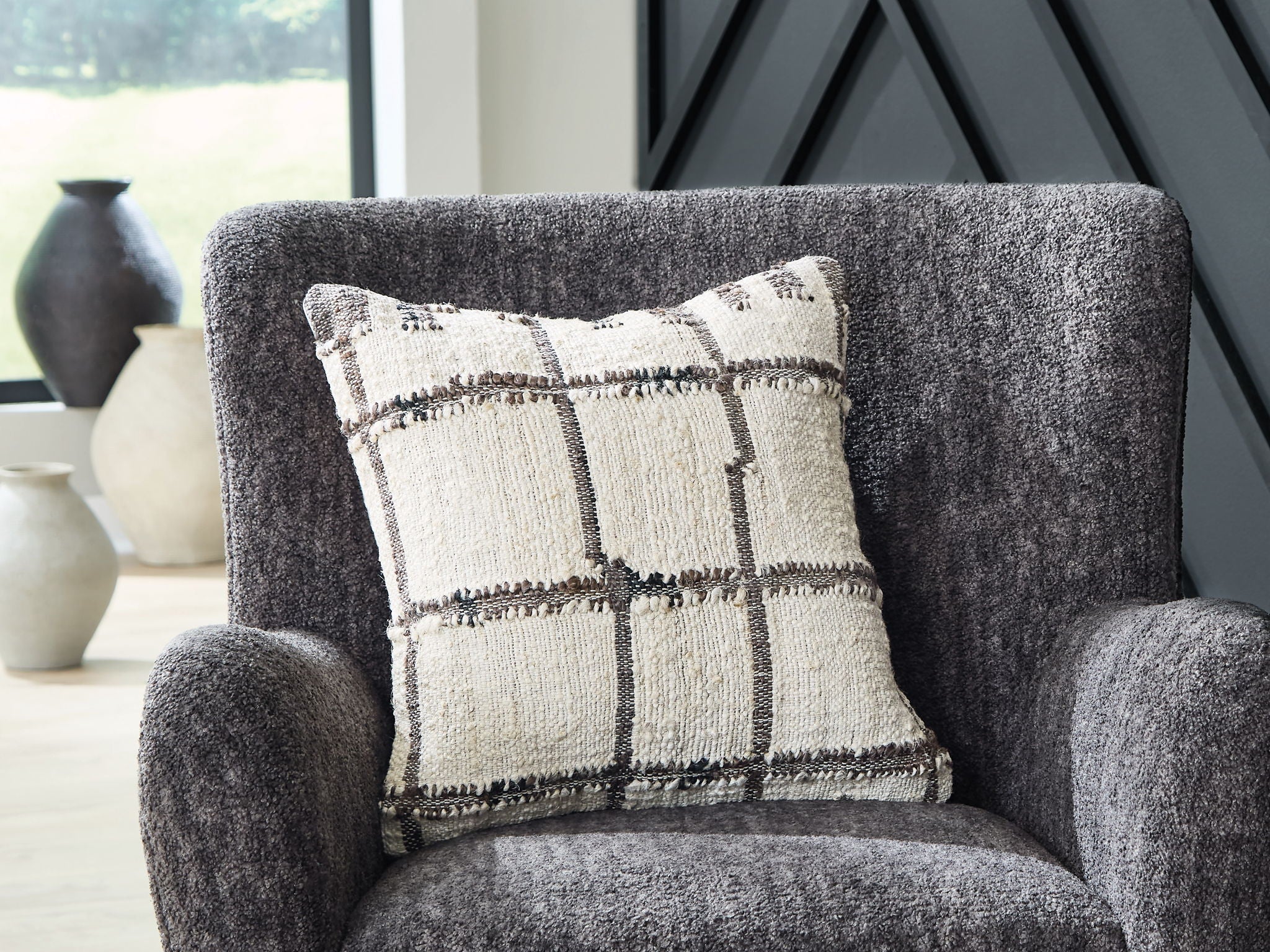 Set of four throw pillows, cream plaid square pattern with brown/black trim, tassel fringe