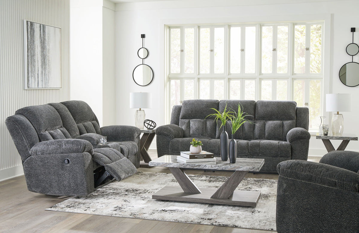 Reclining living room set with dark gray recliner sofa and matching recliner loveseat