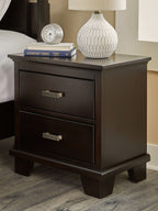 Dark brown two-drawer night stand with brushed metal pulls and sturdy rectangular frame