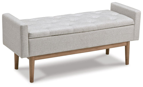 Upholstered storage bench with padded armrests, beige fabric, tapered wooden legs