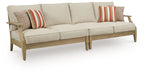 Beige loveseat with cushions and two striped throw pillows