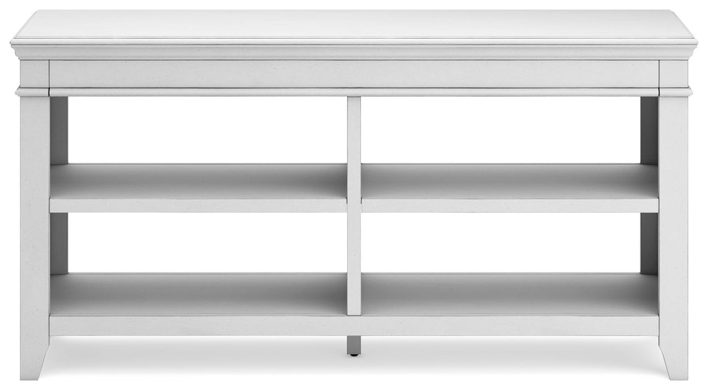 Whitewash credenza with long top, central divider, and two rows of open shelves