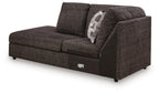 Dark charcoal corner chaise sofa with curved side arm and two seat cushions