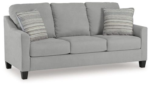 Light gray queen sofa sleeper with rounded arms and two striped throw pillows