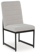 Upholstered dining side chair with padded back and seat, dark metal frame