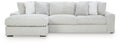 Sectional sofa with chaise, light-colored striped upholstery and padded arm cushions