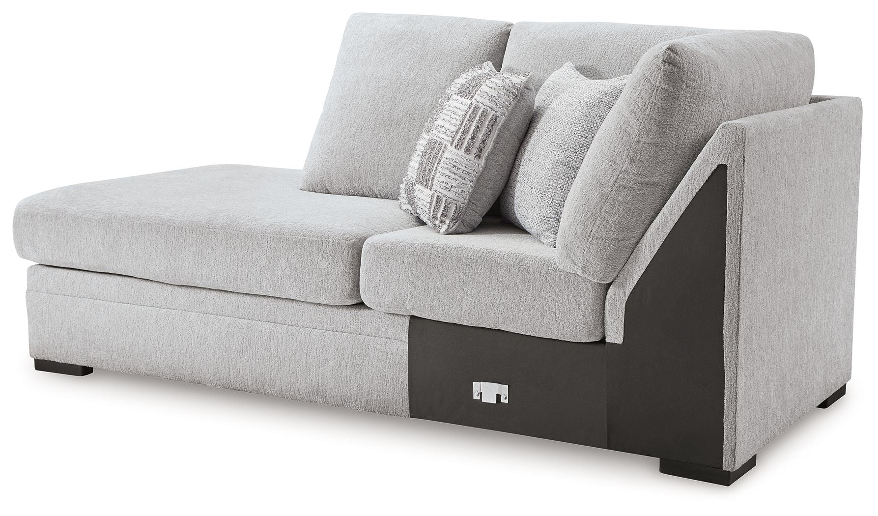 Corner chaise in light gray upholstery with two pillows and dark side arm panel