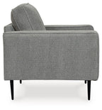 Charcoal fabric upholstered chair, tall back, wide seat cushion, black tapered legs