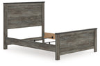 Gray panel bed frame with low footboard and open support base