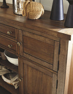 Wood server cabinet with drawers and doors, showing dark finish and metal knobs