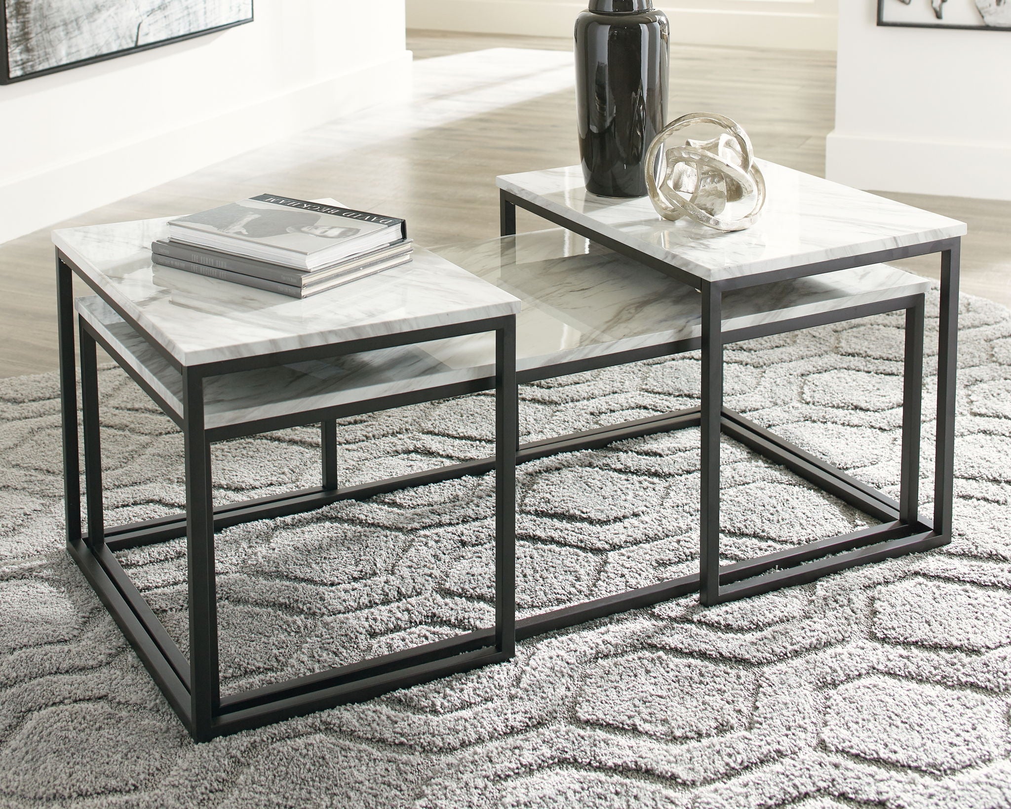3-piece nested table set, gray marble-look surfaces with black rectangular legs and shelves