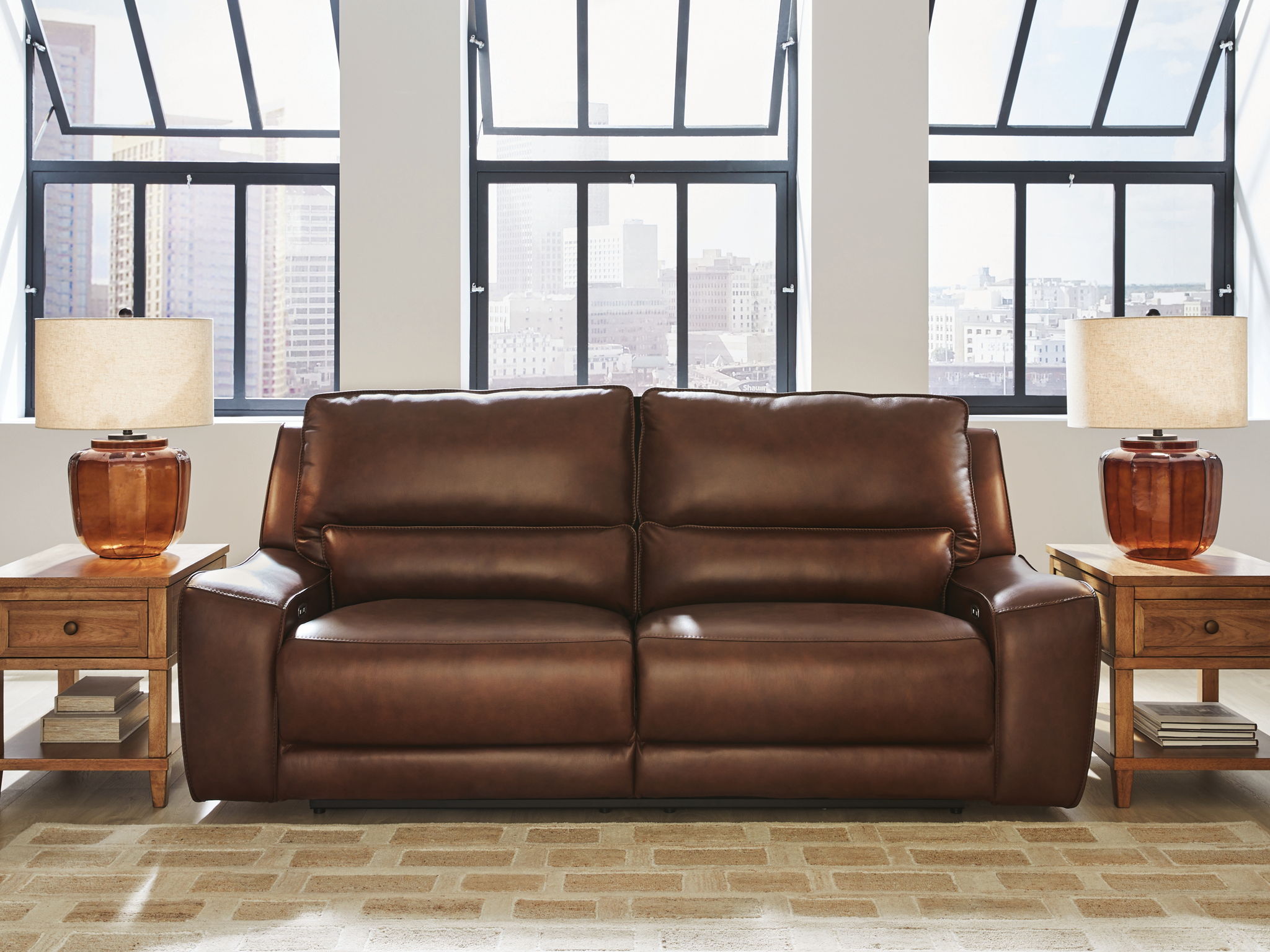 Dark brown power reclining sofa with two seats and adjustable headrests