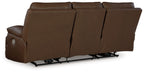 Brown power reclining sofa side view with wide arms and segmented back cushions