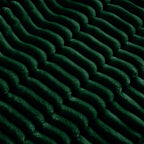 Close-up of green ribbed slipcover fabric on sectional cushions