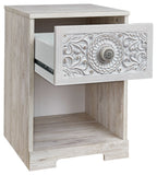 Paxberry whitewash night stand, open cubby and partially extended drawer