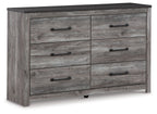 Dark gray dresser with six drawers and metal bar pulls
