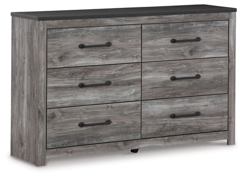 Dark gray dresser with six drawers and metal bar pulls