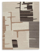 Abstract area rug with cream ground and dark brown/gray stacked block pattern