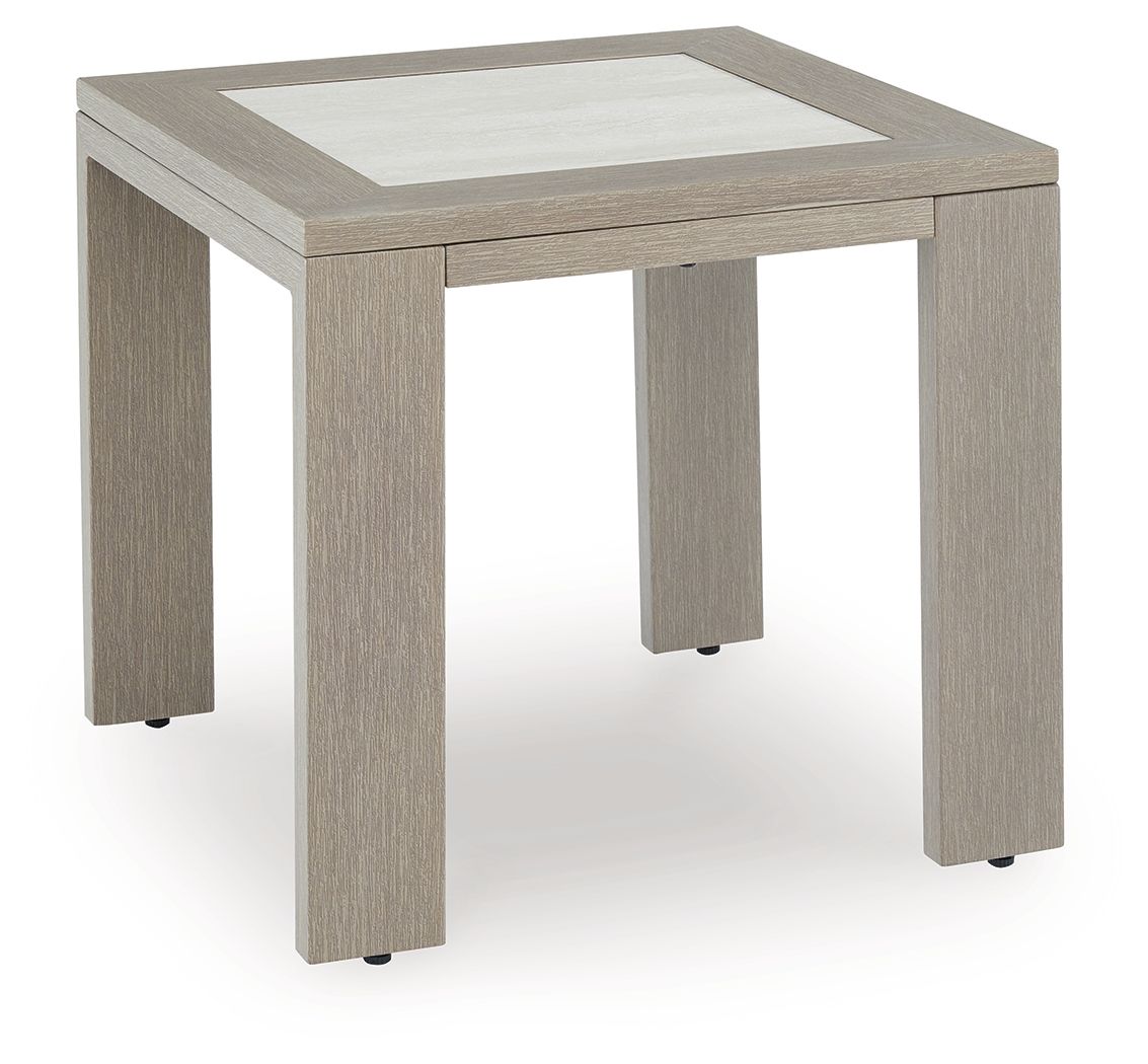 Beige square table with inset light top and four straight legs with feet