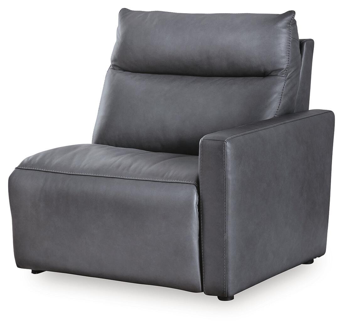 Dark blue power recliner with wide armrests and tufted back cushions