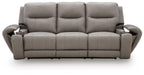 Ash-gray power reclining sofa with audio seating, front view with three seat sections