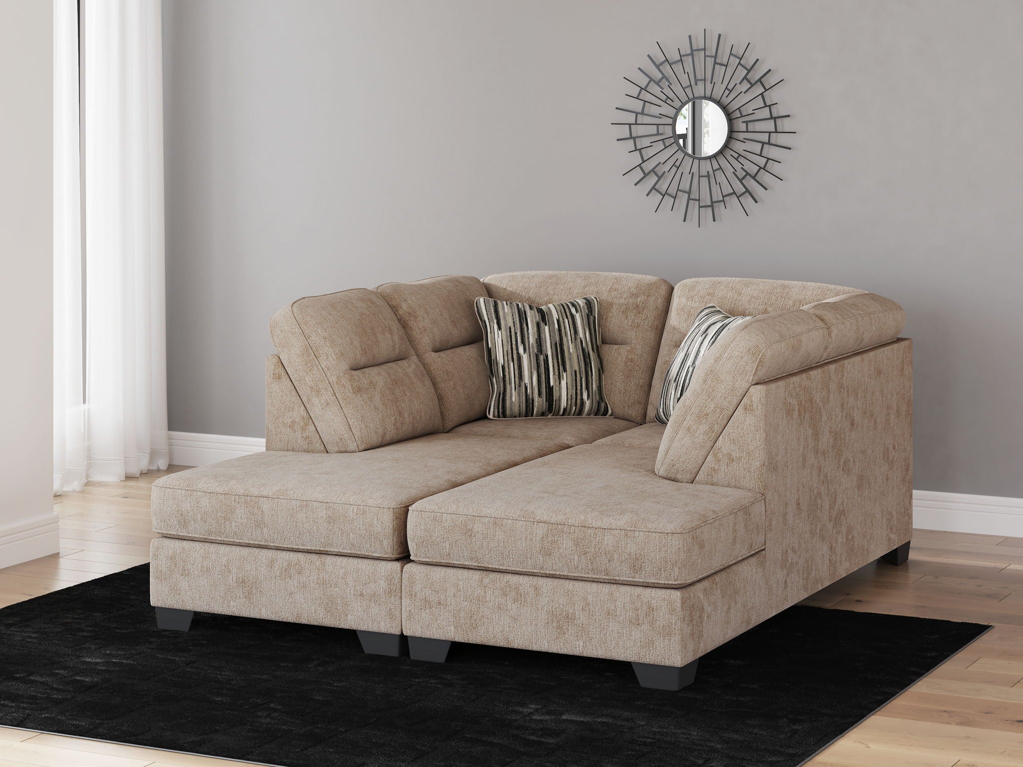 Mocha sectional sofa with chaise extension, tufted cushions and patterned accent pillows