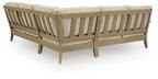 Beige outdoor sectional sofa with slatted wood back and arms, seat cushions