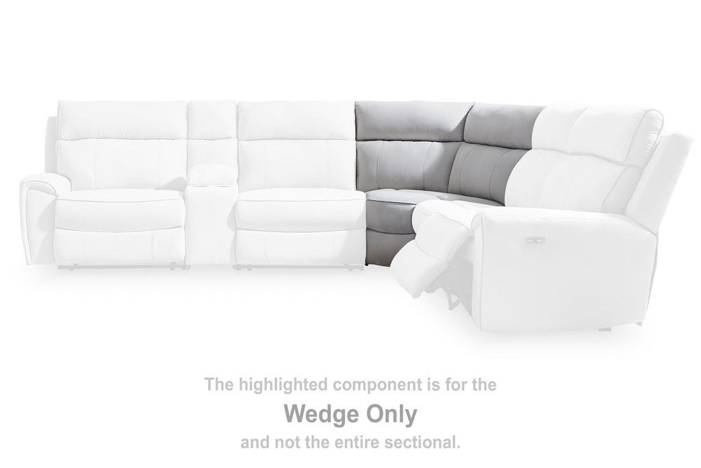 Light gray and white sectional sofa with wedge corner and ottoman-like seat