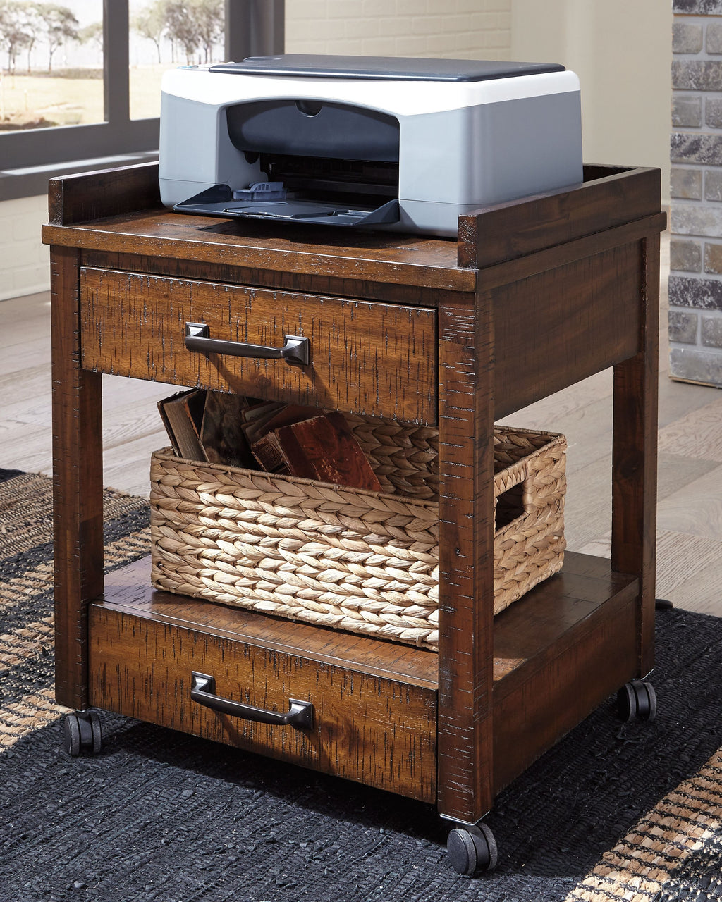 Rustic brown printer stand with open storage basket, two drawers, and caster wheels