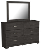 Black wood dresser with large framed mirror and six drawers