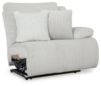 Light gray ribbed fabric power recliner with two square back pillows and wide armrests