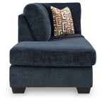 Aviemore dark ink chaise lounge with rounded arm, seat cushion, and geometric throw pillow