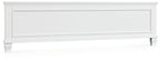 White king panel footboard with raised panels and turned legs