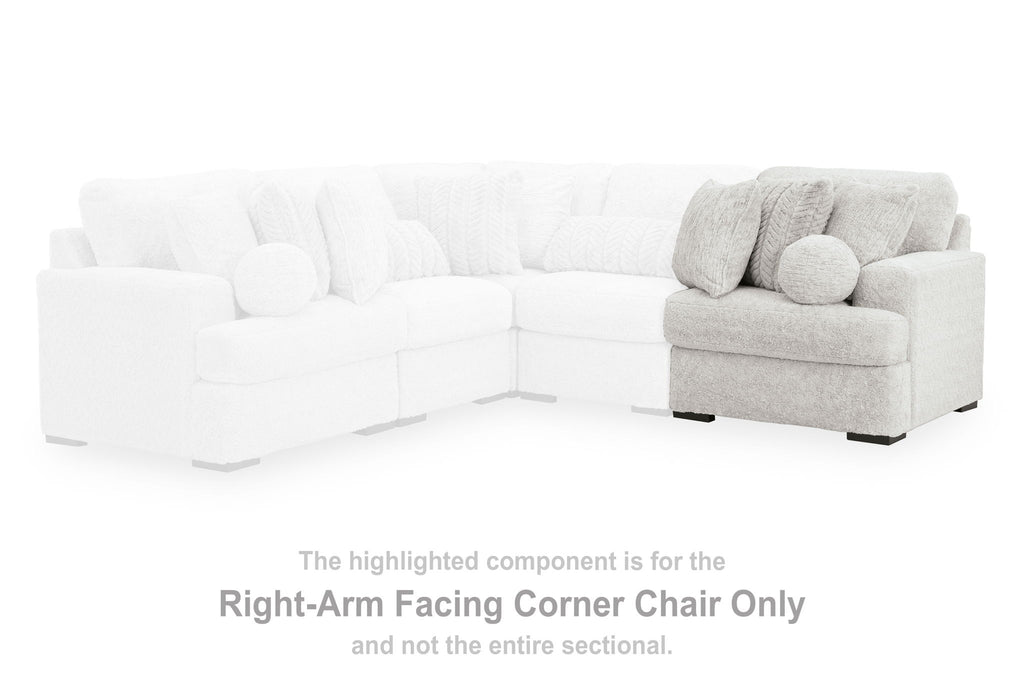 Right-arm corner chair section with light gray textured fabric and padded armrest