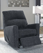 Altari slate rocker recliner, upright position with wide padded arms and recline lever