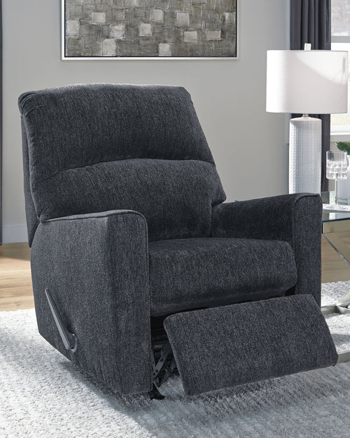 Altari slate rocker recliner, upright position with wide padded arms and recline lever
